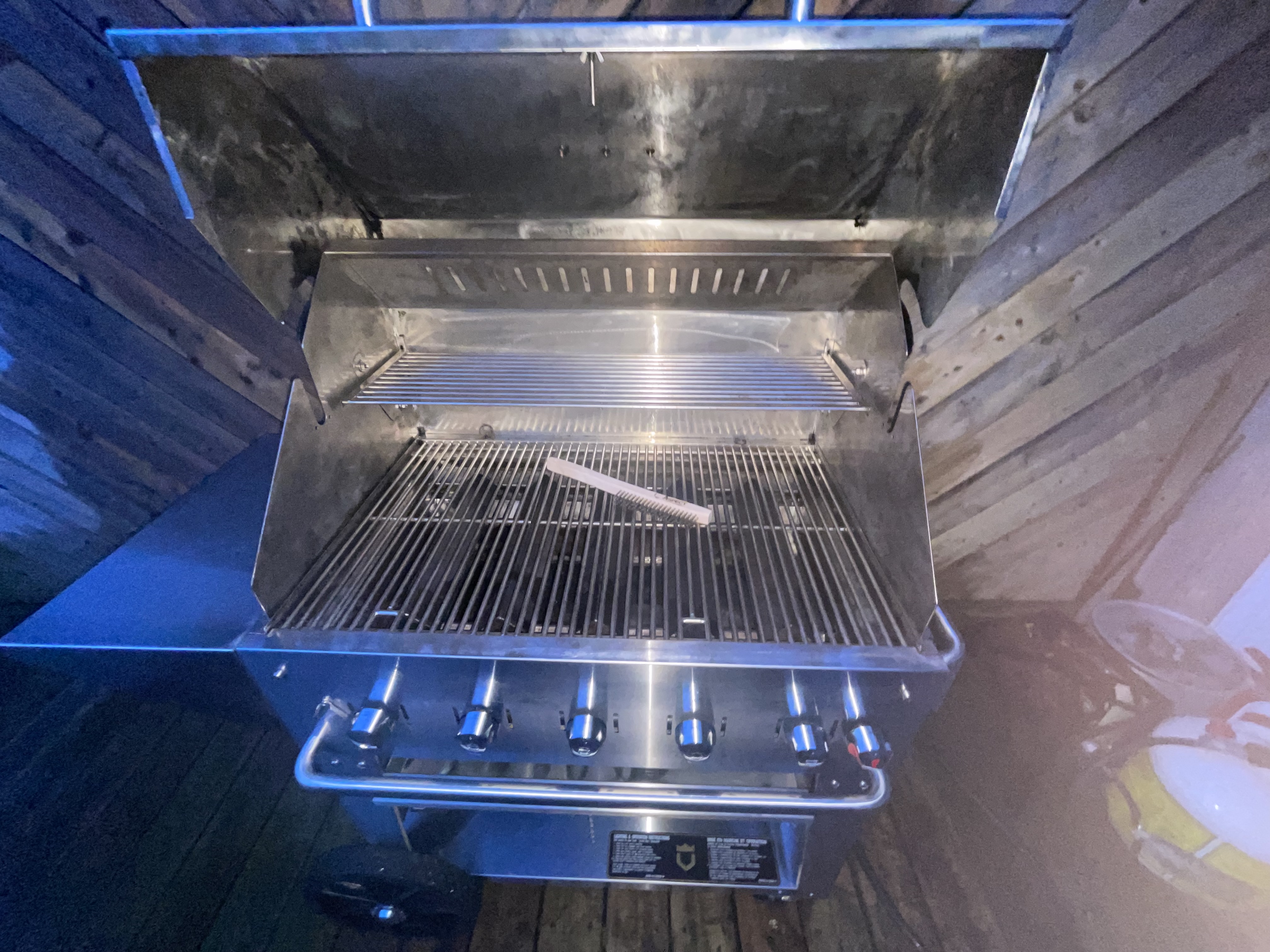 Large stainless Weber Genesis 6-burner cleaned and polished